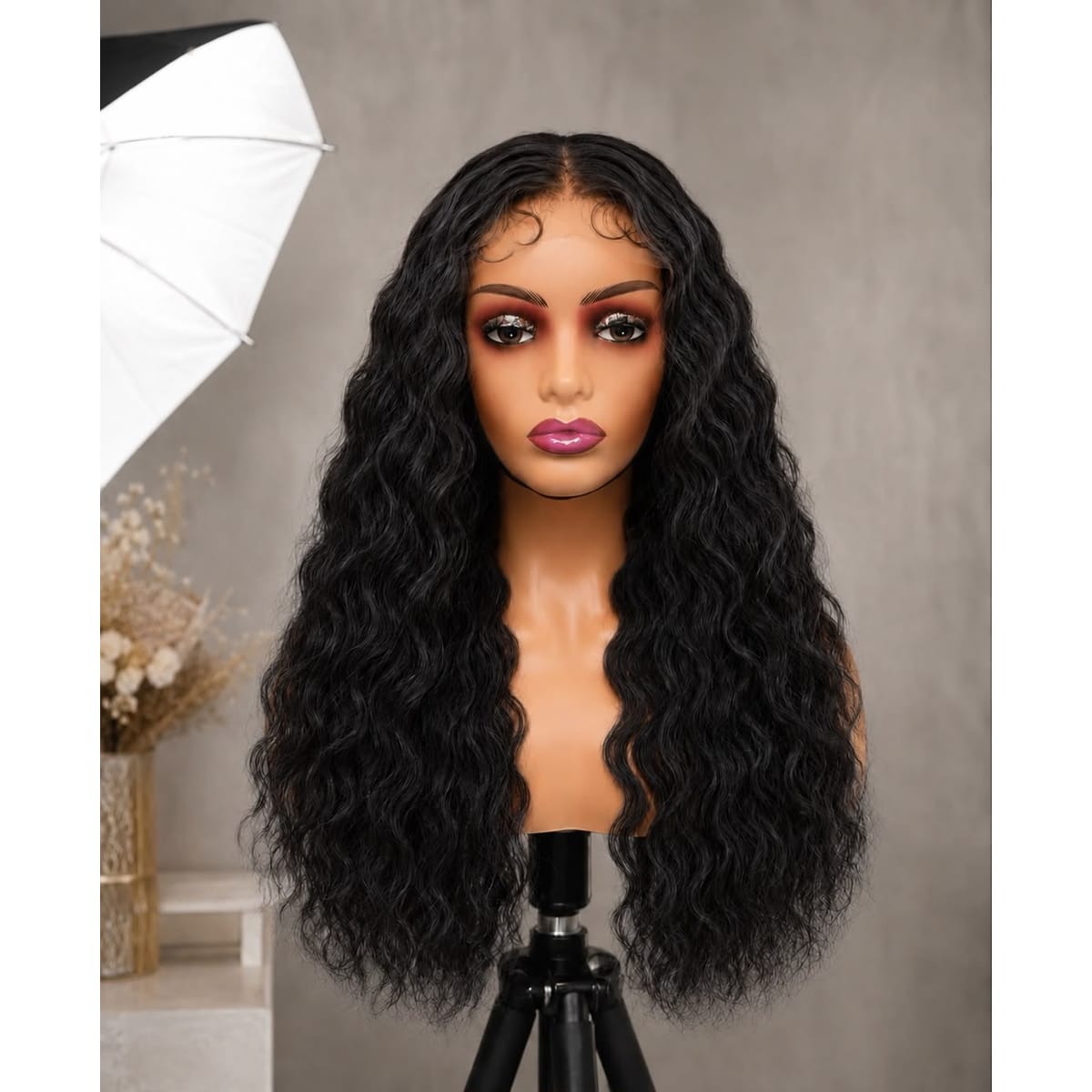 Velour Wave Luxe Futura Blend curly black wig on mannequin head