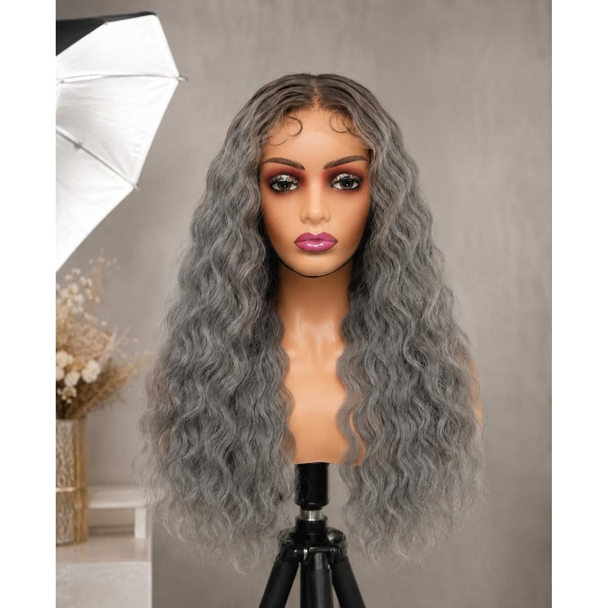 Velour Wave Luxe Futura Blend curly grey wig on mannequin head