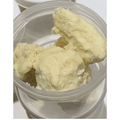Raw shea butter in open 1L container — pure and unrefined
